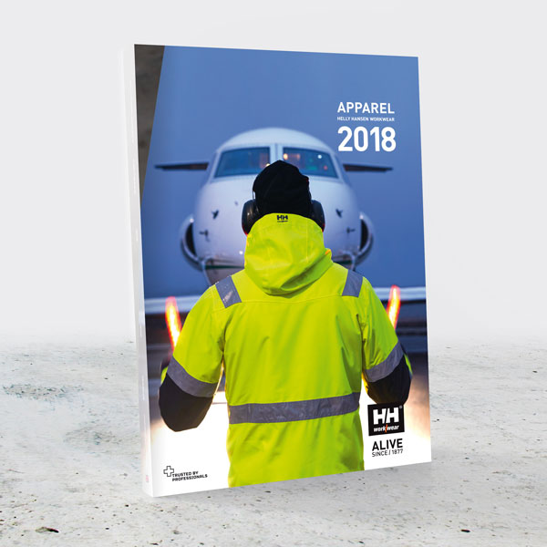 Bildet viser en hovedkatalog for Helly Hansen Workwear på grå bakgrunn.